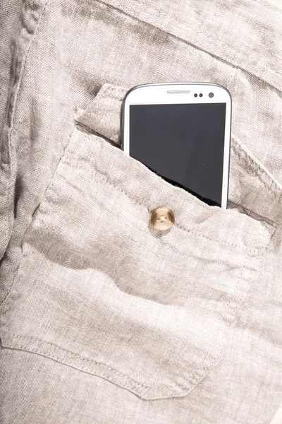Смартфон в кармане — стоковое фото